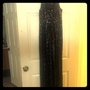 Slightly Used Black sequenced jumpsuit.